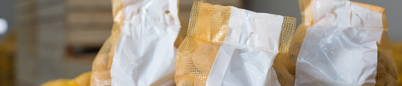 Des sacs de patates prêts à être identifés à l'aide d'une imprimante Citronix