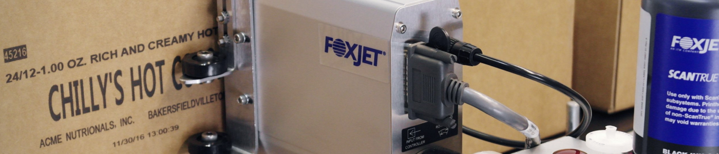 A cardboard box identified for sending thanks to a FoxJet printer